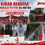 Kirab Bendera Merah Putih 81 Meter Kobarkan Semangat Kemerdekaan di Kota Langsa