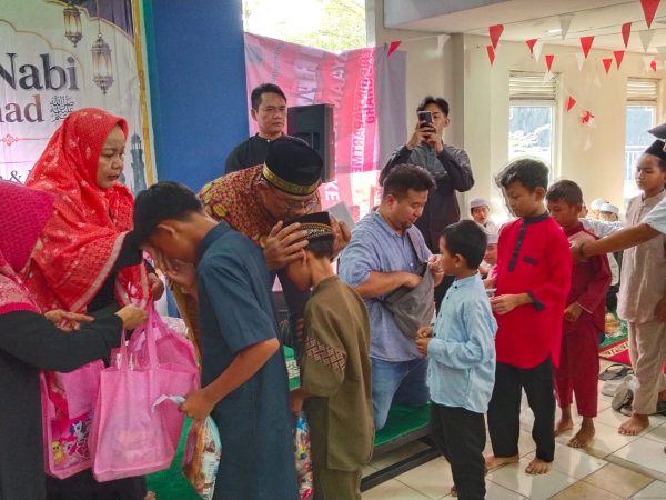 Syiar damai dari apartemen. DKM.grand centeroint Bekasi jaga kerukunan beragama lewat santunan anak yatim dan kaum dhuafa